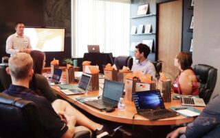 A meeting in the conference room with neurodivergent employees