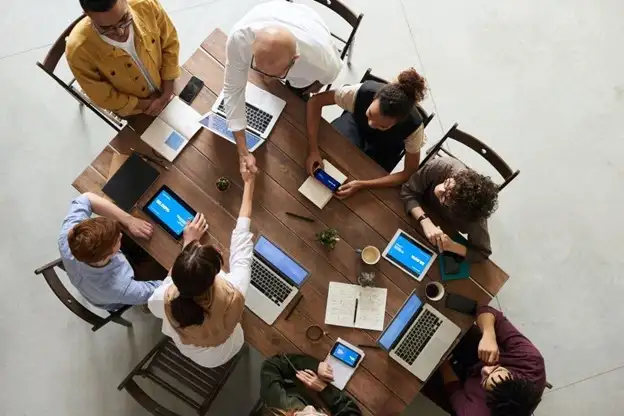 Group of people having a meeting - from top neurodiversity speaker Susan Fitzell, M.Ed., CSP